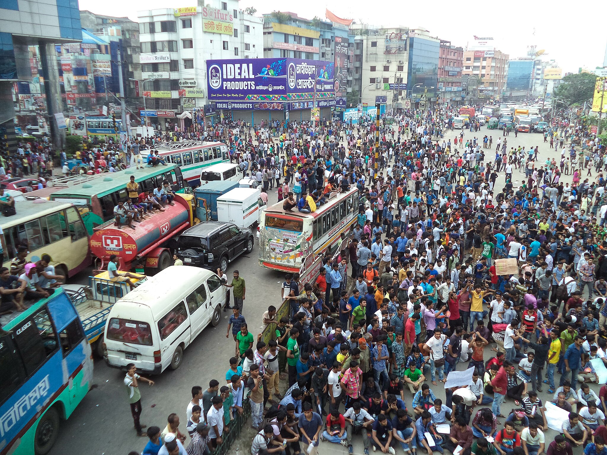 Bangladesh police arrest opposition party leader and ban public gatherings as unrest continues